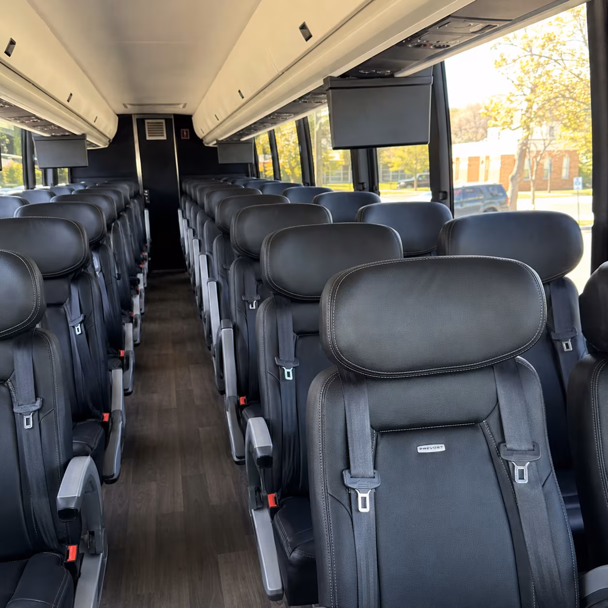 corona 45 passenger charter bus inside