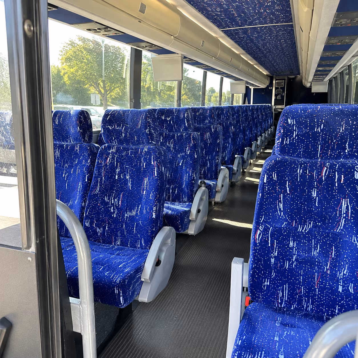 corona 50 passenger charter bus inside