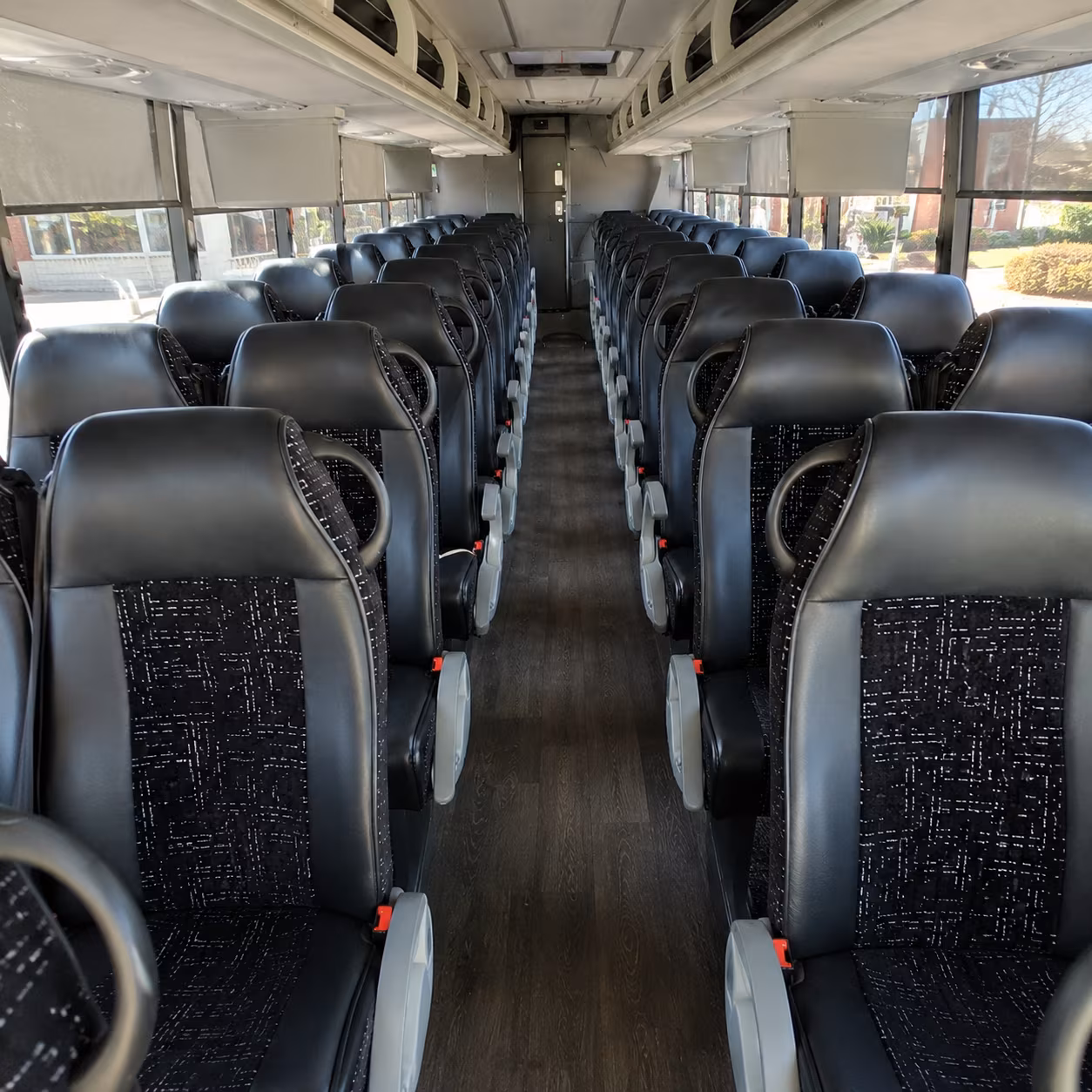 corona 54 passenger charter bus inside